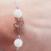 bracelet acier inoxydable papillon et quartz rose