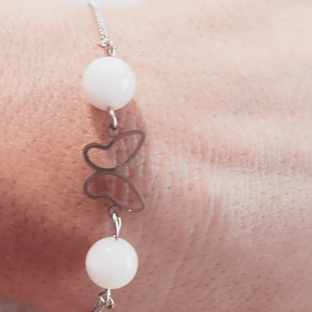 bracelet acier inoxydable papillon et quartz rose