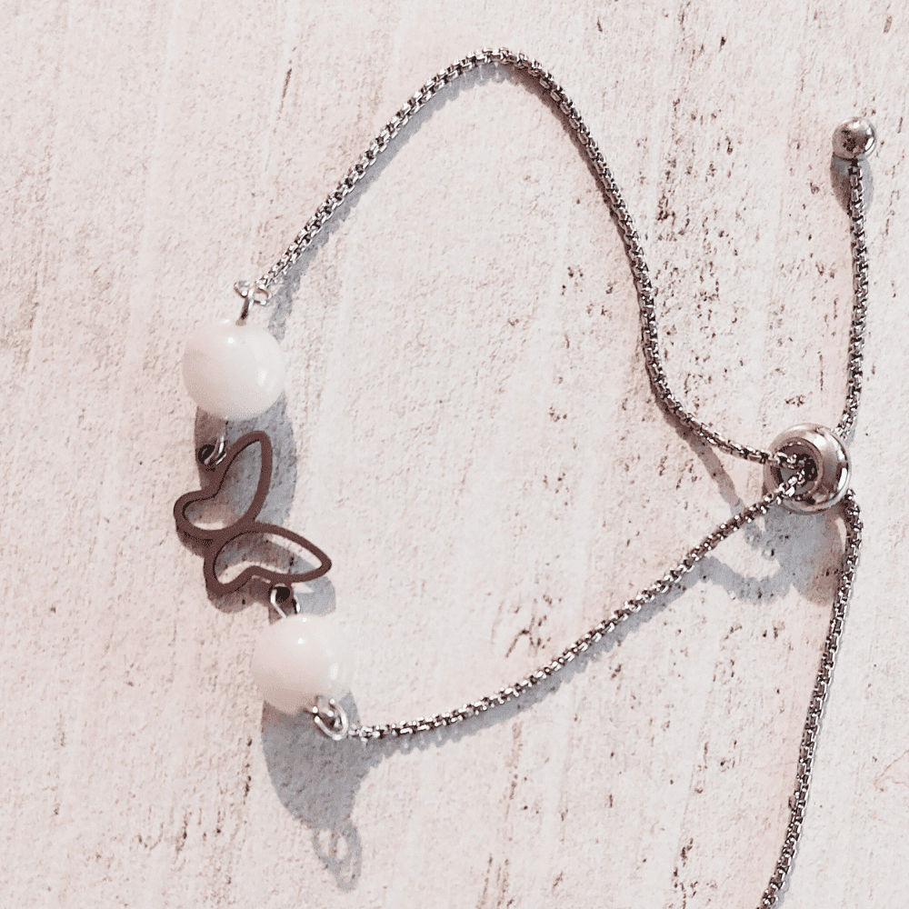 bracelet acier inoxydable papillon et quartz rose